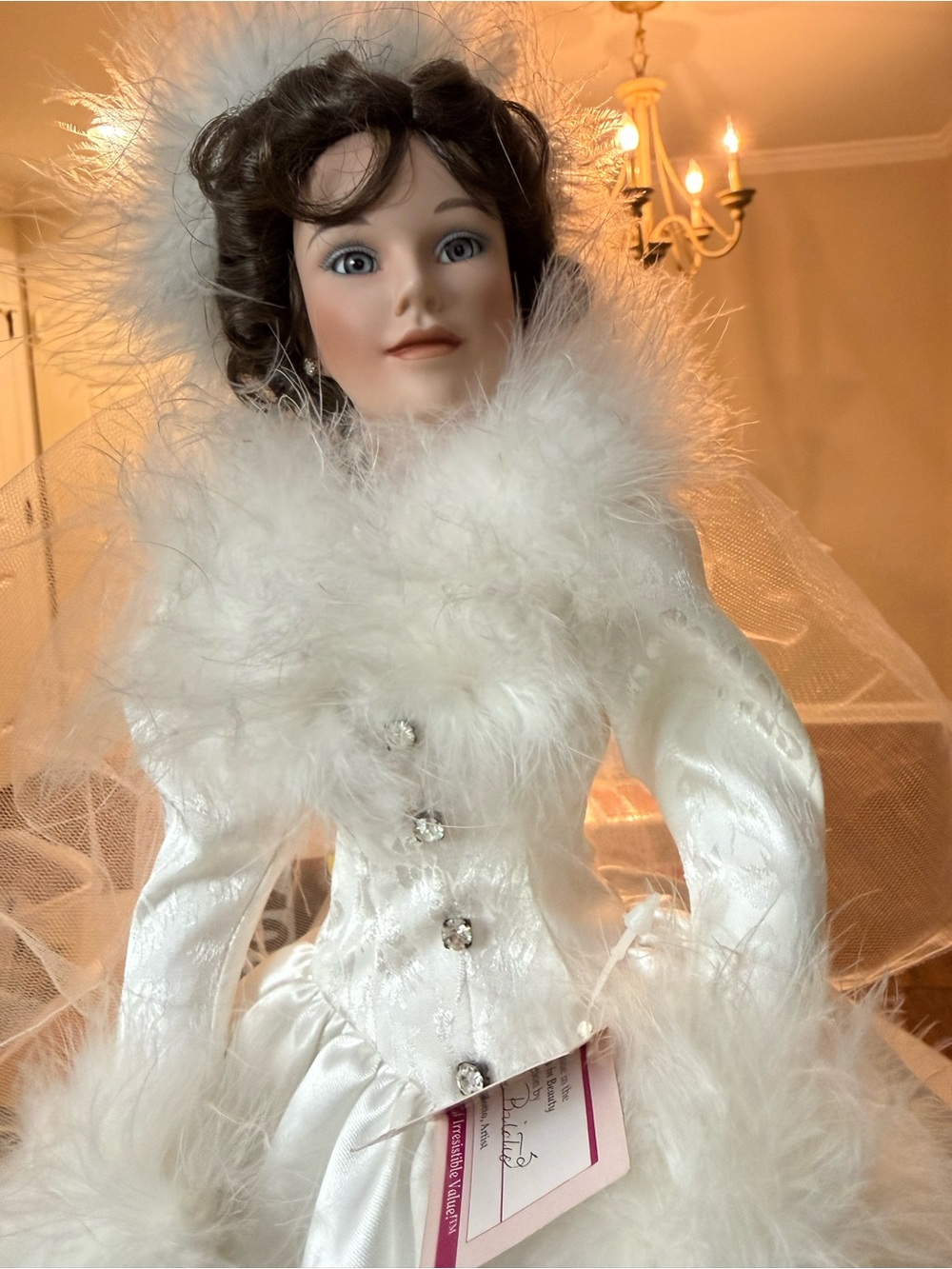 Porcelain Bride Sculpture in White Feathered Gown -
